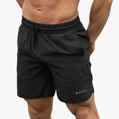 Athletic Performance Shorts with Elastic Waistband, Drawstring Closure, and Subtle Logo Detailing