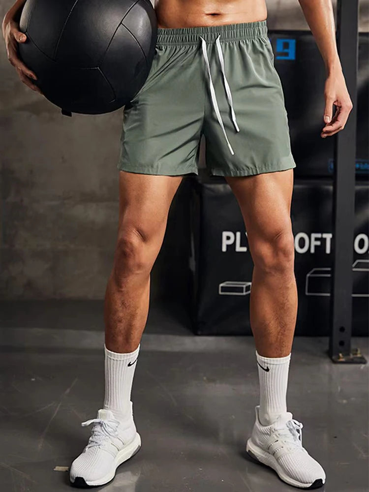 Men's Athletic Training Shorts with Elastic Waistband, Drawstring Closure, and Side Vents for Enhanced Mobility