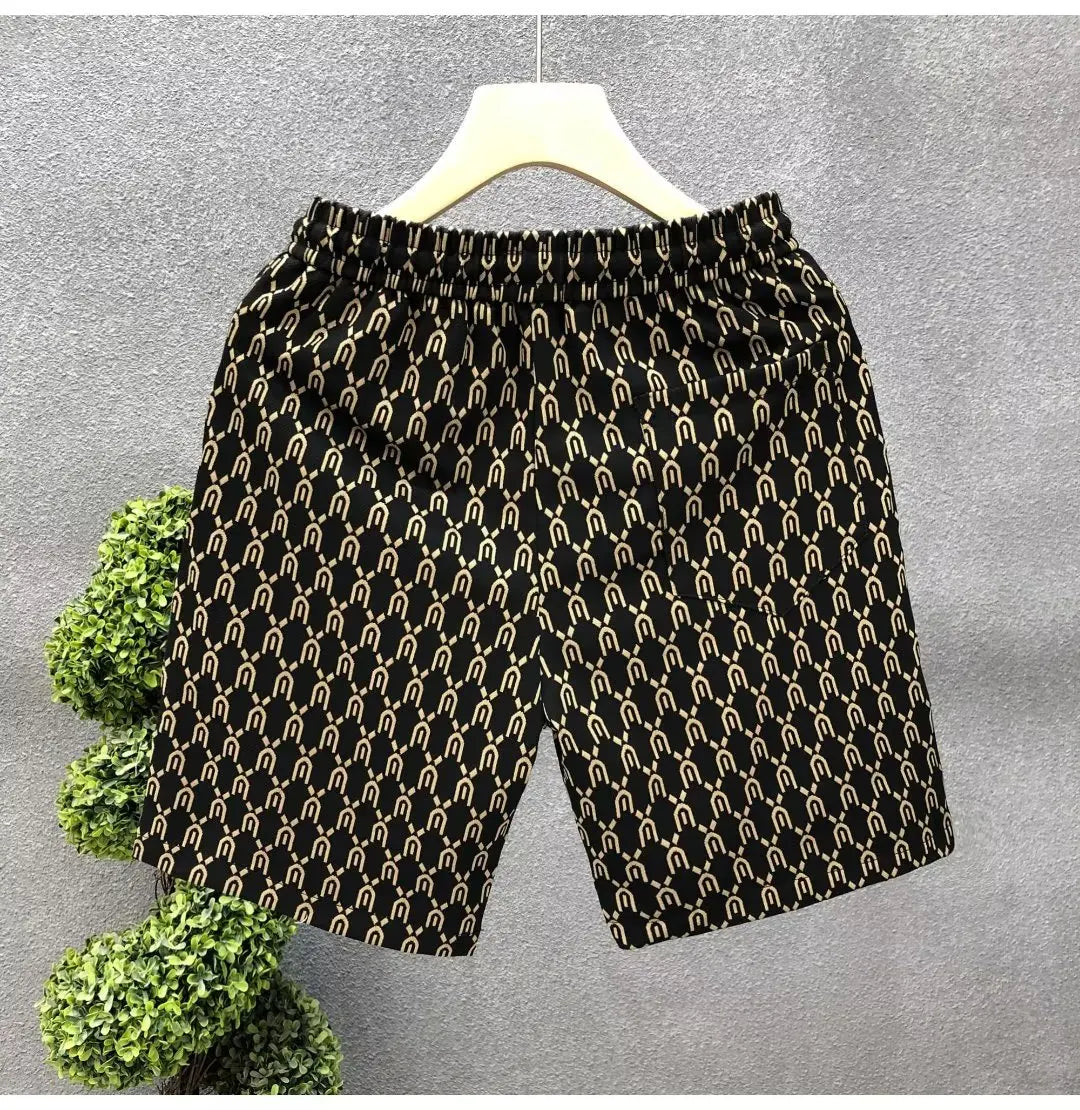 Men's Designer Patterned Shorts with Adjustable Drawstring and All-Over Monogram Print